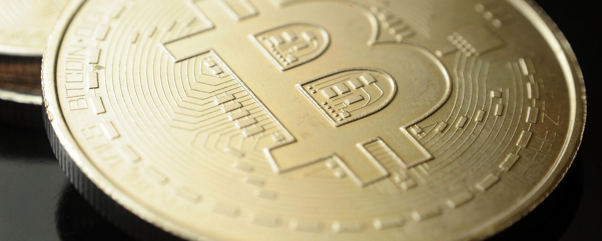 Манета крыптавалюты біткоін - Sputnik Беларусь, 1920, 16.01.2026