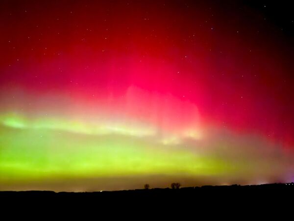 Северное сияние над Саксонией-Анхальт. Фото: Томас Шульц/dpa (picture alliance через Getty Images)