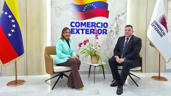 Дмитрий Деревинский и Коромото Годо Кальдерон - Sputnik Беларусь