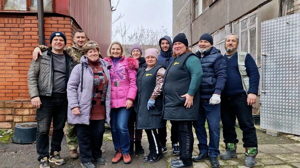 Новая надежда: как в возрождающемся Мариуполе спасают беженцев (видео) - Sputnik Беларусь