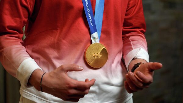 Золотая медаль зимних Олимпийских игр 2026 года в Милане-Кортине  - Sputnik Беларусь