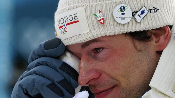 Норвежский биатлонист Стурла Легрейд на ОИ-2026 - Sputnik Беларусь