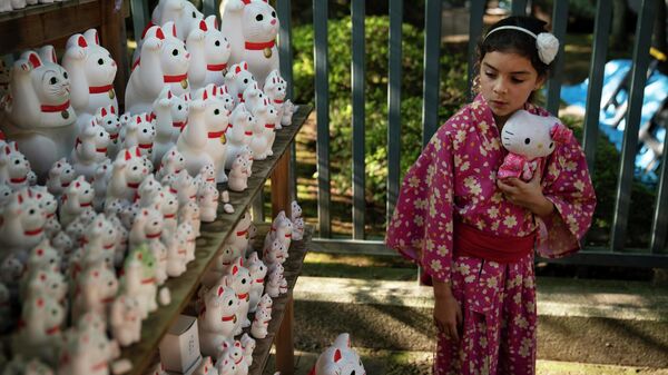 Фигурки кошек в Японии - Sputnik Беларусь