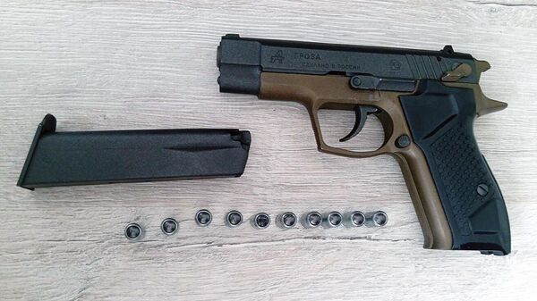Изъятый пистолет Гроза-021 с патронами - Sputnik Беларусь