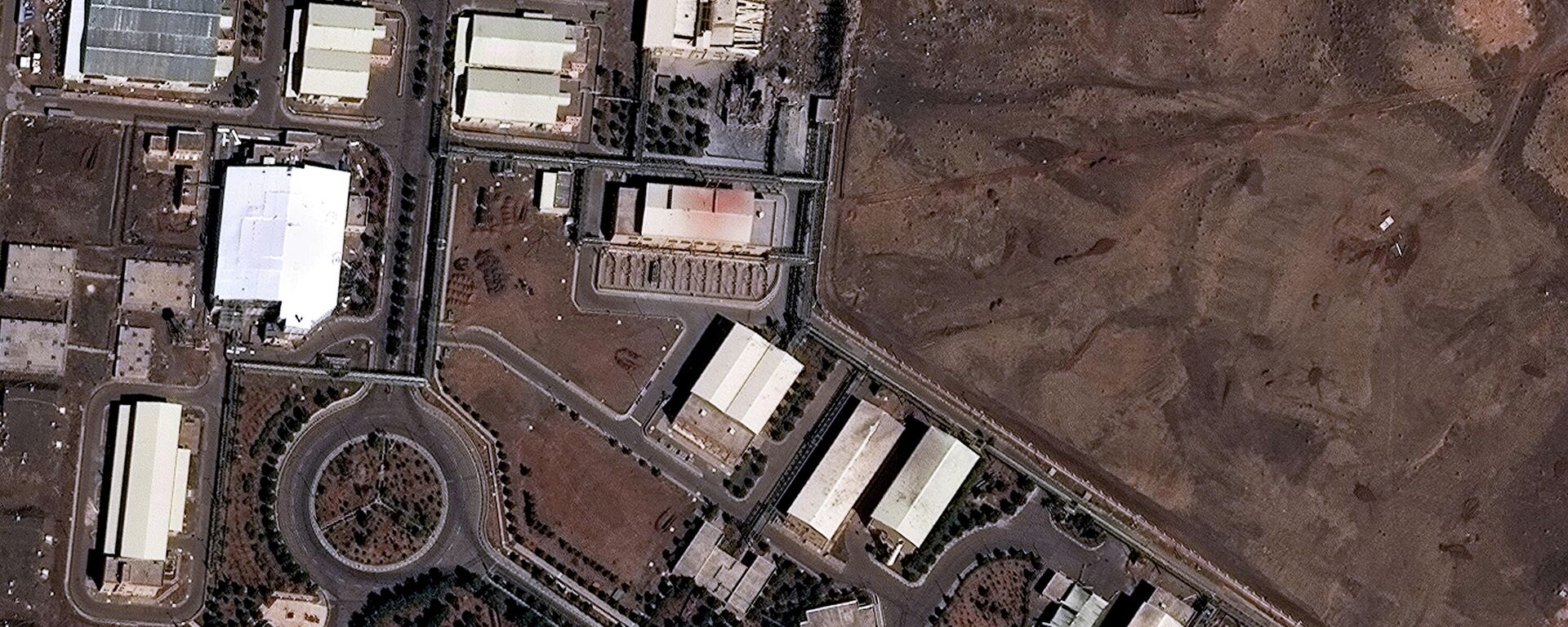 Спадарожнікавы здымак атамнай электрастанцыі ў Натанзе з пашкоджаннямі будынкаў на фоне амерыкана-ізраільскага канфлікту з Іранам - Sputnik Беларусь, 1920, 21.03.2026