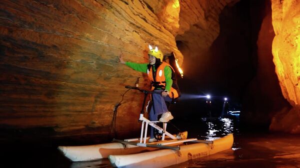 Подземная одиссея: как в Китае покоряют пещеры на гидровелосипедах (видео) - Sputnik Беларусь