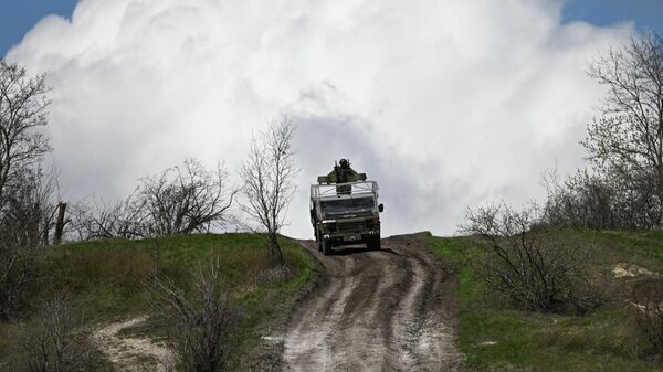 Боевое слаживание штурмовиков группировки войск Запад на Харьковском направлении СВО - Sputnik Беларусь