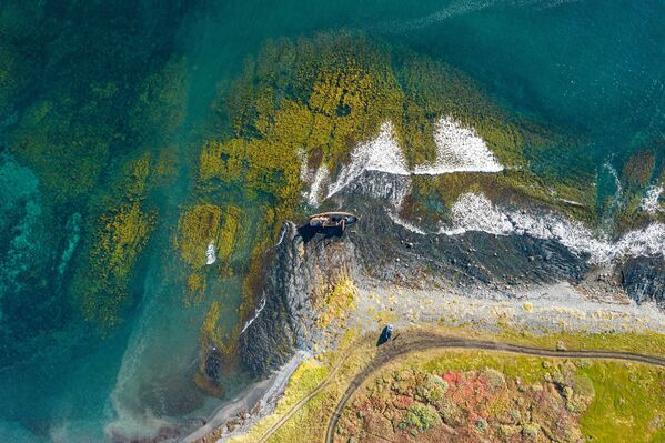 Рыбацкі карабель, выкінуты штормам на бераг мыса Нямецкі, на паўвостраве Рыбачы ў Мурманскай вобласці. - Sputnik Беларусь
