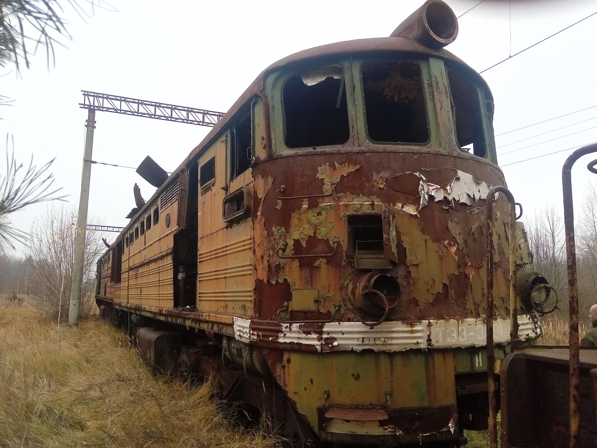 Старый тепловоз в деревне Посудово в белорусской зоне отчуждения - Sputnik Беларусь, 1920, 22.04.2026