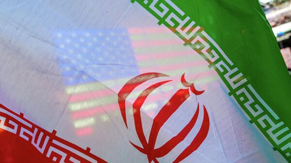Флаги Ирана и США - Sputnik Беларусь