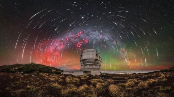 Снимок Geminid Symphony Over La Palma’s Guardian of the Sky фотографа Uroš Fink, вошедший в список 25 лучших фотографий конкурса 2026 Milky Way Photographer of the Year - Sputnik Беларусь