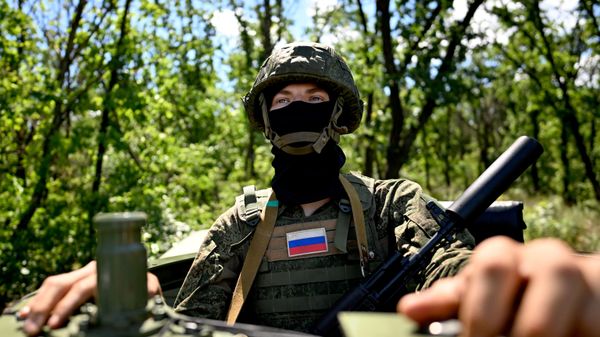 Российский военнослужащий в зоне СВО, архивное фото - Sputnik Беларусь