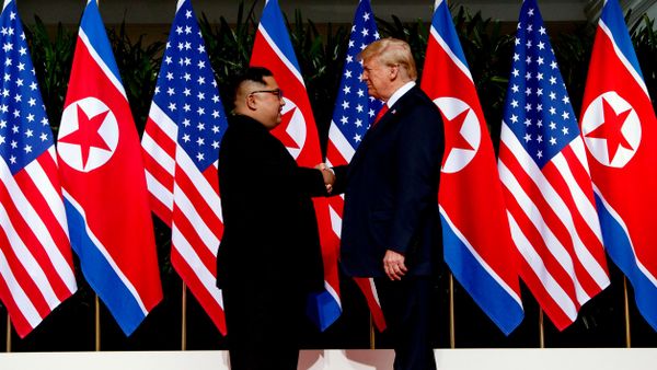 Ким Чен Ын и Дональд Трамп - Sputnik Беларусь