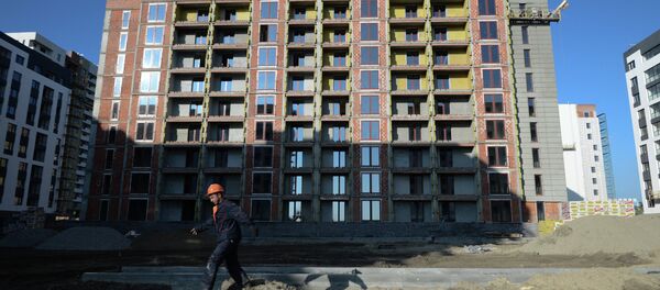 Строительство жилых домов, архивное фото Строительство жилых домов, архивное фото - Sputnik Беларусь