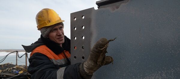 Рабочий на стройке, архивное фото - Sputnik Беларусь