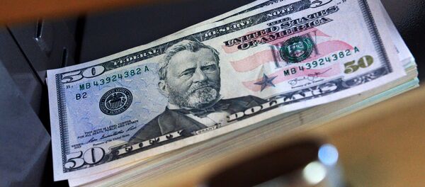 Купюры номиналом 50 долларов США, архивное фото - Sputnik Беларусь