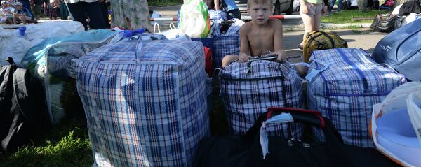 Украинские беженцы - Sputnik Беларусь