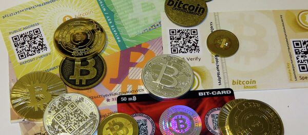 Криптовалюта Bitcoin, архивное фото - Sputnik Беларусь