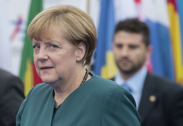 Федеральный канцлер Германии Ангела Меркель перед началом заседания саммита форума Азия-Европа - Sputnik Беларусь
