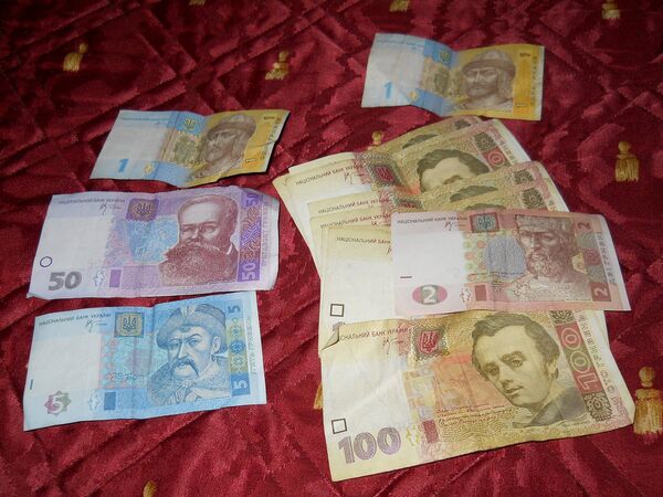 Украинские деньги, архивное фото - Sputnik Беларусь
