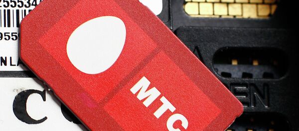 Сим-карта с логотипом оператора сотовой связи МТС - Sputnik Беларусь