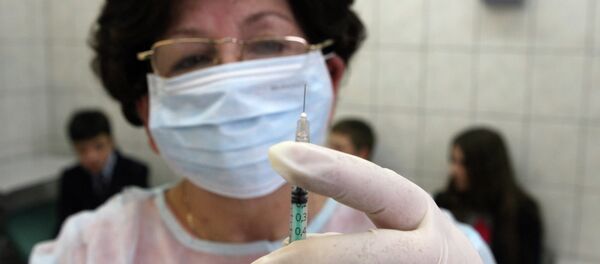 Врач приготавливает инъекцию - Sputnik Беларусь