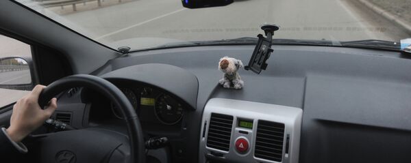 Водитель за рулем автомобиля - Sputnik Беларусь