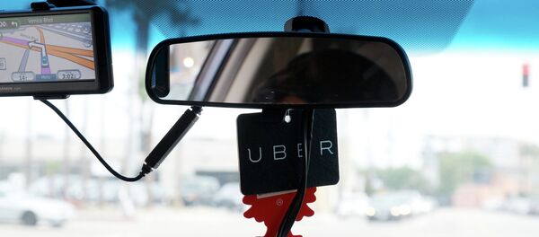 Карточка Uber в машине - Sputnik Беларусь