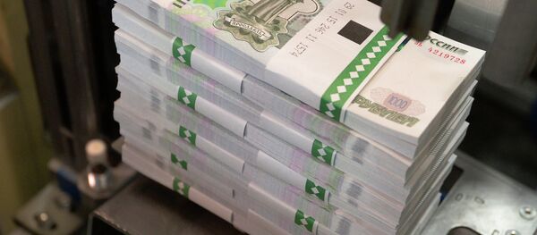 Пачка денежных купюр Пачка денежных купюр - Sputnik Беларусь