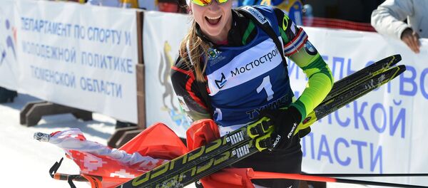 Дарья Домрачева на финише масс-старта среди женщин в соревнованиях по биатлону на Приз губернатора Тюменской области в Тюмени - Sputnik Беларусь