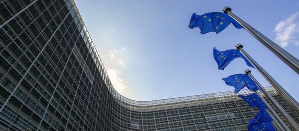 Флаги Евросоюза возле штаб-квартиры ЕС в Брюсселе - Sputnik Беларусь