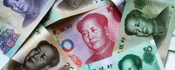 Китайские денежные купюры-юани - Sputnik Беларусь