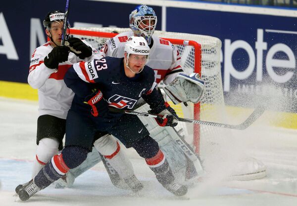 Четвертьфинальный матч Чемпионата мира по хоккею между сборными США и Швейцарии - Sputnik Беларусь