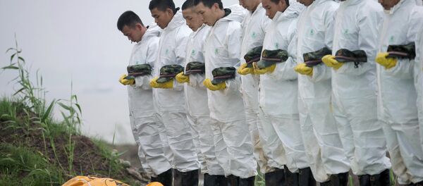 Жертвы крушения теплохода Звезда Востока на реке Янцзы в Китае - Sputnik Беларусь