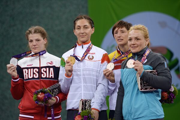 Призеры соревнований среди женщин по вольной борьбе в весовой категории до 75 кг - Sputnik Беларусь