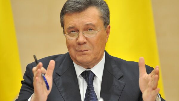 Отстраненный от должности президента Украины Виктор Янукович - Sputnik Беларусь