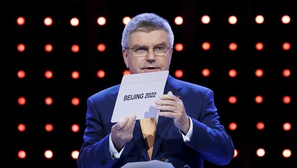 Президент МОК Томас Бах объявляет столицу Олимпийских игр-2022 - Sputnik Беларусь