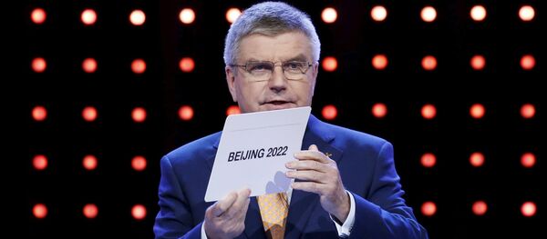 Президент МОК Томас Бах объявляет столицу Олимпийских игр-2022 - Sputnik Беларусь