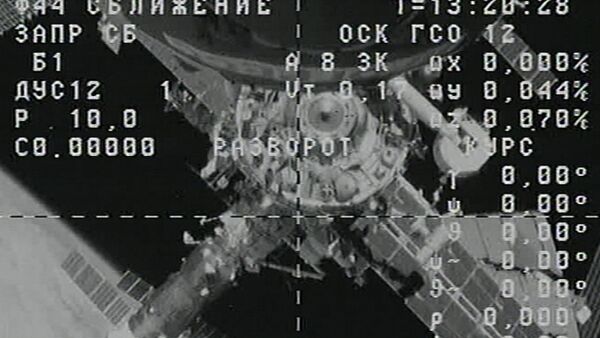 Спутник_Грузовой корабль Прогресс М-26М отстыковался от МКС. Кадры из космоса - Sputnik Беларусь