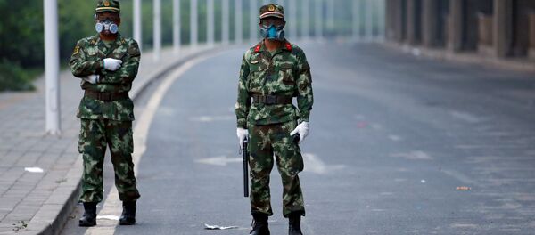 На подъезде к месту взрыва в Тяньцзине выставлена военизированная охрана - Sputnik Беларусь