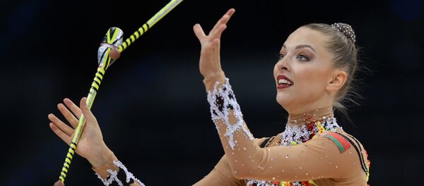 Мелитина Станюта выполняет упражнения с булавами - Sputnik Беларусь