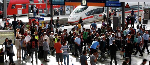 Мигранты на вокзале Мюнхена - Sputnik Беларусь