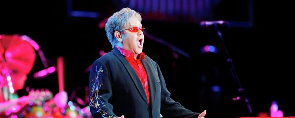 Британский певец Элтон Джон Британский певец Элтон Джон - Sputnik Беларусь