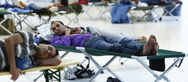 Мигранты в лагере для беженцев в Германии - Sputnik Беларусь