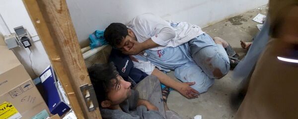 Посетители госпиталя в Кундузе во время обстрела - Sputnik Беларусь