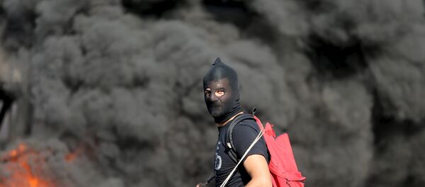 Палестинский демонстрант Палестинский демонстрант - Sputnik Беларусь