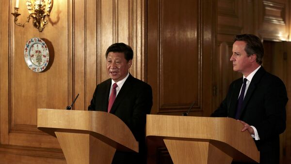 Пресс-конференция председателя КНР Си Цзиньпина (слева) и премьер-министра Великобритании Дэвида Кэмерона - Sputnik Беларусь