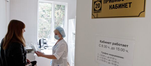 Вакцинация от гриппа в одной из поликлиник - Sputnik Беларусь