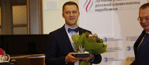 Старший преподаватель филологического факультета БГУ Гордей Хомич Старший преподаватель филологического факультета БГУ Гордей Хомич - Sputnik Беларусь