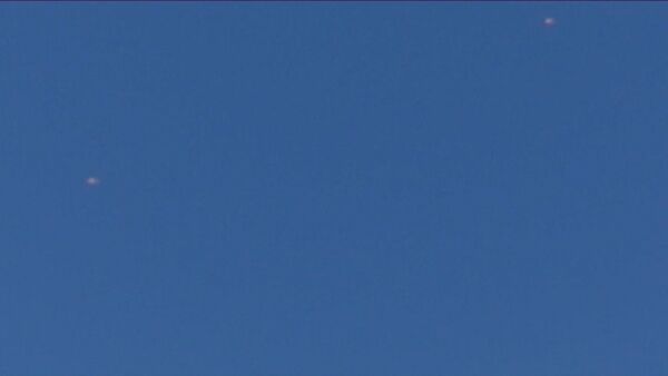СПУТНИК_Очевидцы сняли на видео два парашюта в небе после падения Су-24 в Сирии - Sputnik Беларусь